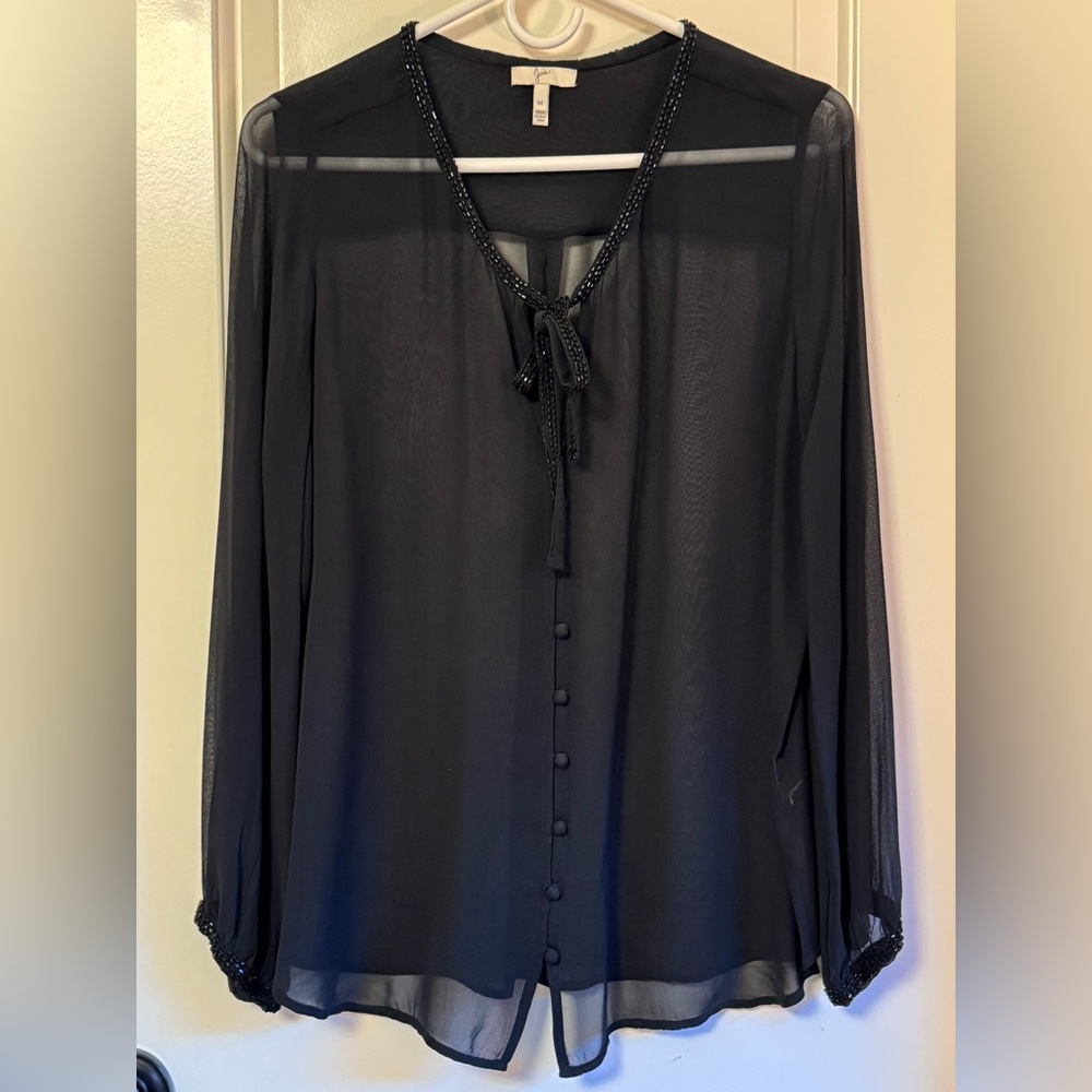 Joie. Silk top w beading at neck and wrists. Black. Size M
